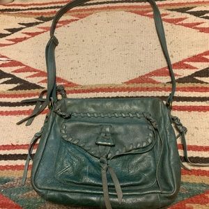 Green Lucky Purse no stains. Leather is broke in